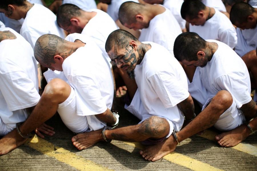 Mara Salvatrucha (MS-13) gang members wait to be escorted upon their arrival at the maximum-security jail in Zacatecoluca, El Salvador, June 22, 2017. MS-13 gang,MS-13,MS-13 gang members,Members of MS-13,El Salvador,crime-ravaged,Central American nation