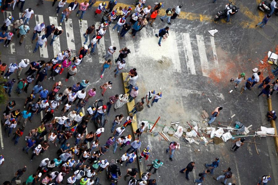 Demonstrators congregate during a rally against Venezuelan President Nicolas Maduro's government in Caracas, Venezuela June 22, 2017. Venezuela airbase,Venezuela,Deadly protest at Venezuela
