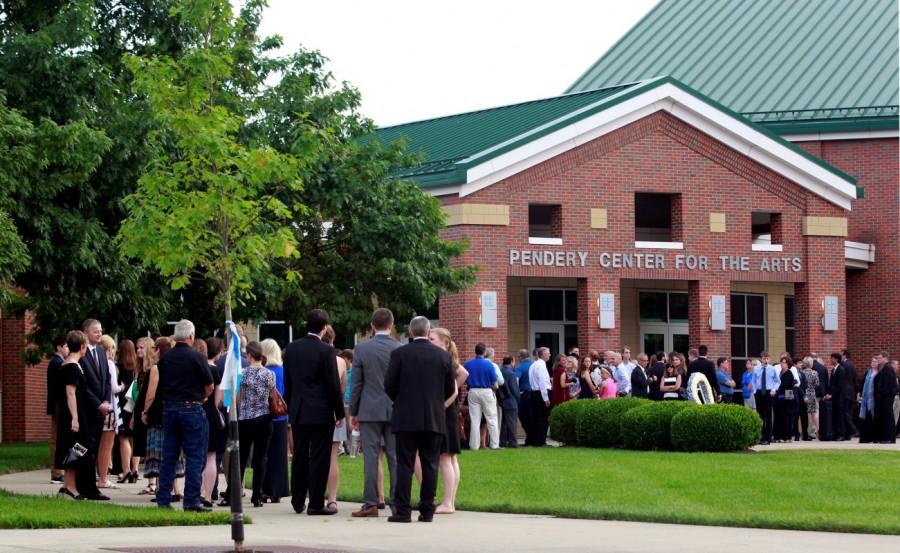 Mourners stand out side the art center before a funeral service for Otto Warmbier at Wyoming High School in Wyoming, Ohio. Funeral for student,Funeral for student held prisoner,Otto Warmbier,United States