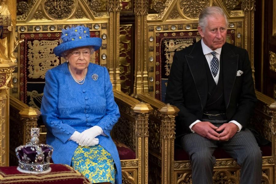 Britain's Queen Elizabeth sits next to Prince Charles during the State Opening of Parliament in central London, Britain June 21, 2017. Queen Elizabeth,European Union flag,Queen Elizabeth opens UK parliament,UK parliament,Britain's Queen Elizabeth,Prince Charles