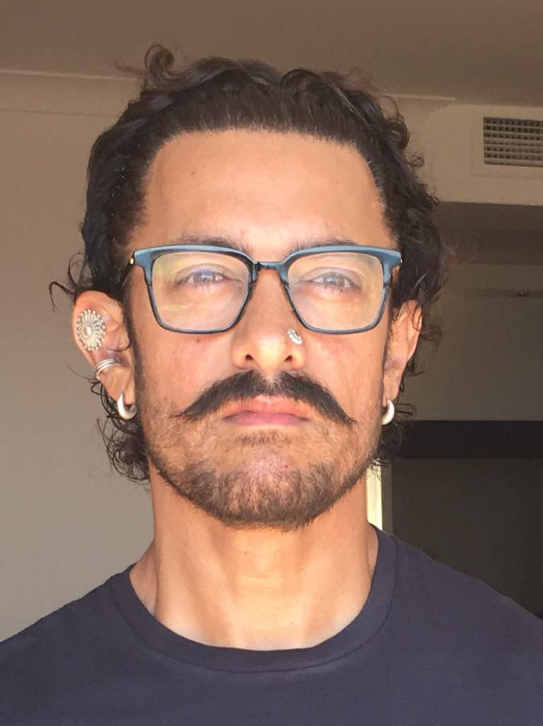 Aamir Khan who is well known to fall into the skin of his character has undergone some painful measures for his upcoming flick. The actor underwent permanent nose and ear piercing for his role in Thugs of Hindostan. Aamir is now coming up with an altogether different look as his role in Thugs of Hindustan has demanded a nose piercing and two ear piercing on the right. This is not his full look but glimpses of what he has done physically. Aamir Khan,actor Aamir Khan,Thugs of Hindostan,Aamir Khan look in Thugs of Hindostan,thugs of hindostan movie,Aamir Khan's painful transformation,Aamir Khan transformation