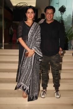 Bollywood filmmaker Madhur Bhandarkar and actor Kirti Kulhari during the launch of Qawwali Chadhta Soorag from film Indu Sarkar, in Mumbai on June 28, 2017.