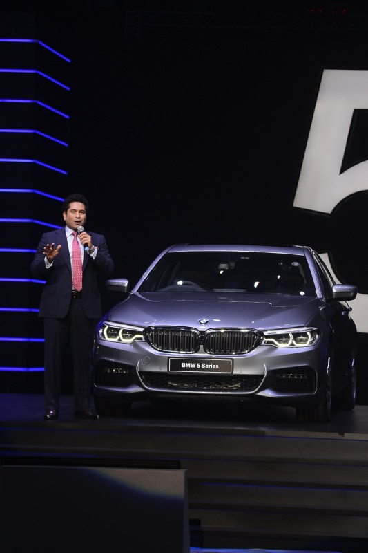 Former Indian cricket player Sachin Tendulkar unveils the all-new BMW 5 Series in Mumbai. Sachin Tendulkar,BMW 5 Series,BMW 5,BMW 5 Series launch,BMW 5 Series launch pics,BMW 5 Series launch images,BMW 5 Series launch stills,BMW 5 Series launch pictures