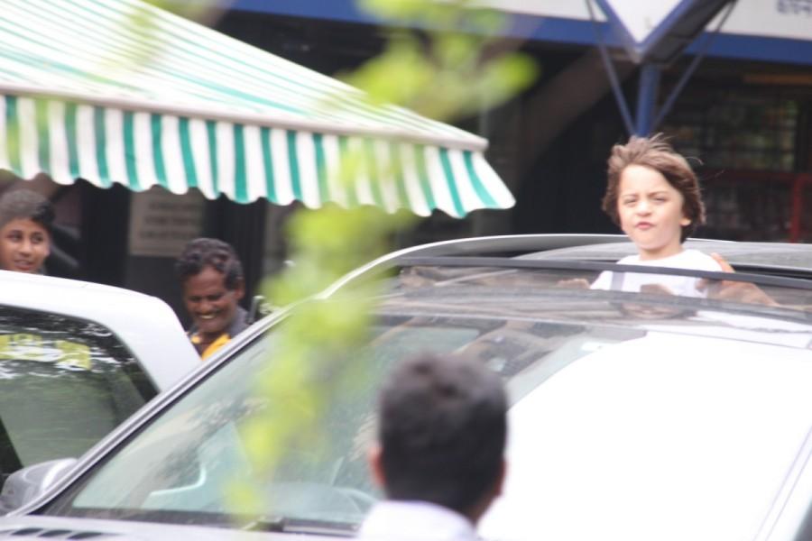 SRK's Son Abram Enjoying Open Car Ride On Mumbai Roads. AbRam Khan,Shahrukh Khan,Shahrukh Khan son,Shahrukh Khan son AbRam Khan,AbRam Khan car ride at Bandra,AbRam Khan car ride