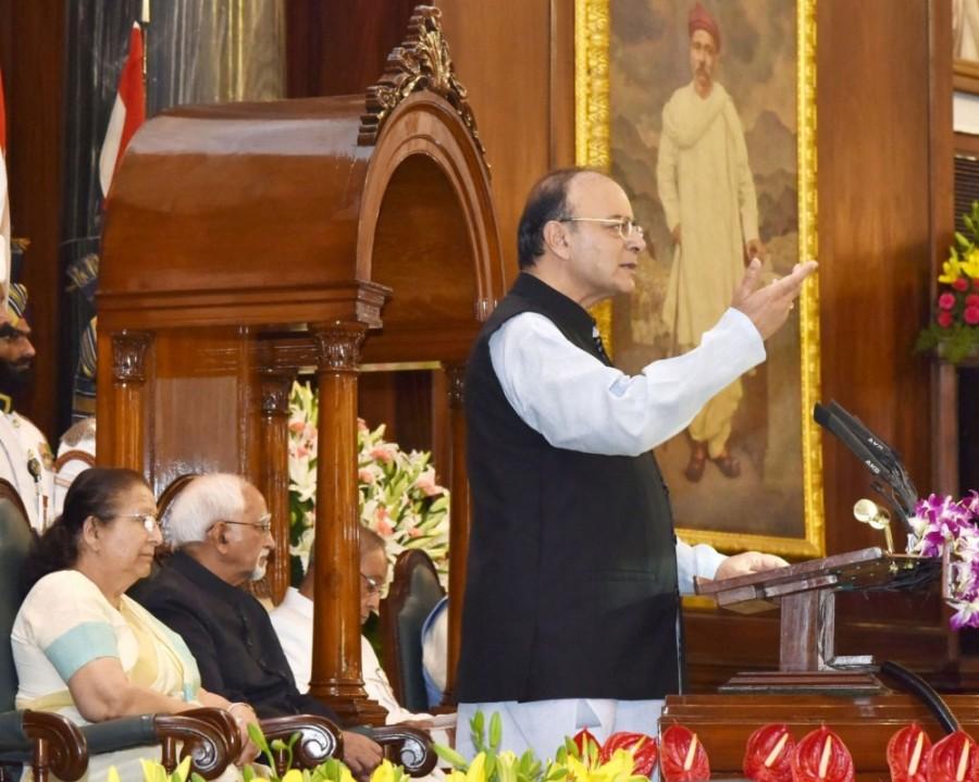 The GST process cannot be confined to just economic system but was a collective effort of all, he said, adding it was a product of long discussions among the best brains of the country. "It is an example of Team India's strength and ability," he said. Referring to the eminent personalities like Jawaharlal Nehru, Sardar Patel, Maulana Abul Kalam Azad and Babu Rajendra Prasad who had adorned the Central Hall, Modi said like Patel had integrated the country, the GST would integrate the country economically. He described the GST as 'Good and Simple Tax' -- good because there will be no tax on tax and simple because there will be only one form of tax. It will also help eliminate black money and corruption because of the transparency it seeks to bring in, he said. Modi said whatever was lacking in growth and development of the country, GST will provide the opportunity to realise them. Ahead of the launch, the GST Council slashed the rate of fertilisers from 12 per cent to 5 per cent and of exclusive parts of tractors from 28 per cent to 18 per cent to reduce the burden on farmers. The launch of GST, which the government claimed would result in reduction of prices of articles of common consumption, also came amidst fears from various business sections that prices would go up under the new regime. GST rolls out,GST,GST launch,GST Launch Parliament,GST Launch June 30 Midnight,GST Launch June 30,GST Launch Midnight,GST Launch LIVE Updates,gst launch from july 1