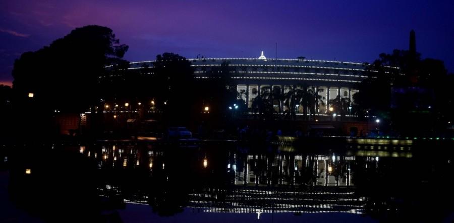 Ahead of the launch, Parliament was in its shinning glory on Friday evening with its main building decked with rows of bright bulbs. Inside, the brightly-lit corridors provided the backdrop for photography, with some visitors, staff and security personnel taking pictures and selfies. Elaborate security arrangements have been made for the event, with security personnel present at the venue hours before its security. With the city witnessing intermittent rains through the day, the route to be taken by the President and the Prime Minister to the Central Hall from Parliament corridor have been covered with bright red and white canopy. Parliament,Indian Parliament,GST rollout,GST,Parliament House,Indian Parliament House