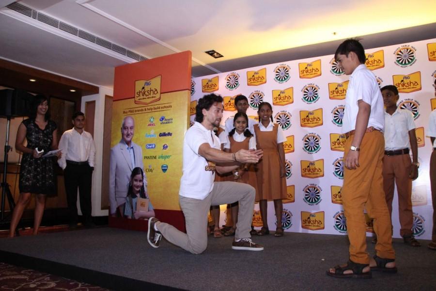 Tiger will join hands with P&G Shiksha to make differences in the lives of underprivileged children and will promote the campaign Shiksha Superheroes. Tiger Shroff,actor Tiger Shroff,Shiksha Superheroes,Shiksha Superheroes campaign,P&G Shiksha Movement,Tiger Shroff pics,Tiger Shroff images,Tiger Shroff stills,Tiger Shroff pictures,Tiger Shroff photos