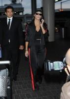 Kourtney Kardashian,Kourtney Kardashian spotted in black and red tracksuit,Kourtney Kardashian bikini pics,Kourtney Kardashian bikini images,Kourtney Kardashian bikini stills,Kourtney Kardashian curves,Kourtney Kardashian curves pics,Kourtney Kardashian f