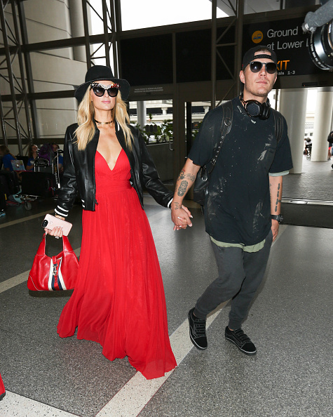 Paris Hilton and boyfriend Chris Zylka are seen at LAX. Paris Hilton and Chris Zylka,Paris Hilton,Chris Zylka,Paris Hilton and Chris Zylka pics,Paris Hilton and Chris Zylka images,Paris Hilton and Chris Zylka stills,Paris Hilton and Chris Zylka pictures,Paris Hilton and Chris Zylka photos