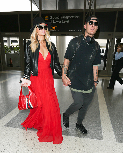 Paris Hilton and Chris Zylka are seen at LAX on June 30, 2017. Paris Hilton and Chris Zylka,Paris Hilton,Chris Zylka,Paris Hilton and Chris Zylka pics,Paris Hilton and Chris Zylka images,Paris Hilton and Chris Zylka stills,Paris Hilton and Chris Zylka pictures,Paris Hilton and Chris Zylka photos