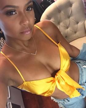 American singer Christina Milian shows her stunning hourglass curves.