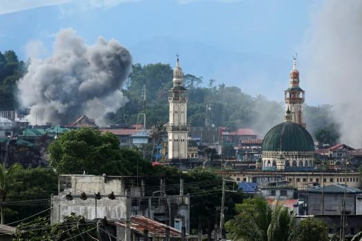 Smoke is seen following a Philippine Army airstrike.