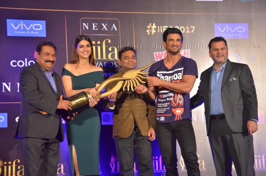 Actors Kriti Sanon and Sushant Singh Rajput with composer AR Rahman during a press conference regarding International Indian Film Academy (IIFA) Awards; in New Delhi on July 4, 2017. Kriti Sanon,Sushant Singh Rajput,AR Rahman,IIFA Awards press conference,IIFA Awards,IIFA Awards press conference pics,IIFA Awards press conference images,IIFA Awards press conference stills,IIFA Awards press conference pictures,IIFA Awards press conferenc
