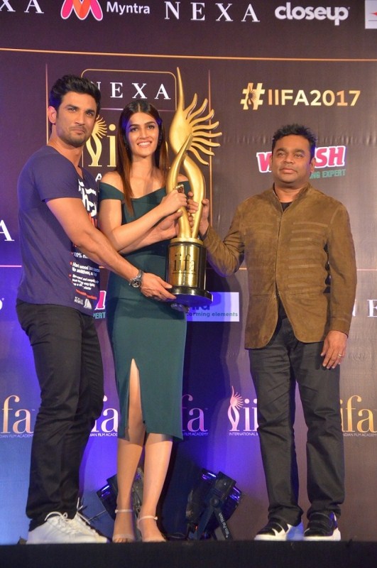 To highlight the upcoming IIFA Weekend and Awards in the Big Apple, the legendary musical genius A.R. Rahman was joined by Bollywood youth icons Kriti Sanon & Sushant Singh Rajput at an official IIFA press conference held in PVR Director's Cut, Ambience Mall in New Delhi. Kriti Sanon,Sushant Singh Rajput,AR Rahman,IIFA Awards press conference,IIFA Awards,IIFA Awards press conference pics,IIFA Awards press conference images,IIFA Awards press conference stills,IIFA Awards press conference pictures,IIFA Awards press conferenc