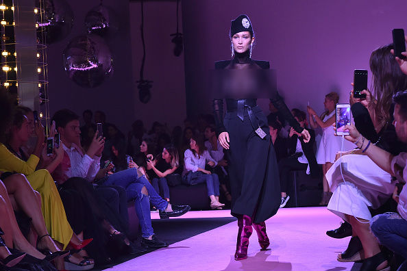 Fashion model Bella Hadid hits the Paris runway in a see-through black top. Bella Hadid,Bella Hadid nude,bella hadid boobs,bella hadid nipples,bella hadid nip slip,Bella Hadid naked dress,Bella Hadid see-through black top,Bella Hadid nude pics,Bella Hadid nude images,Bella Hadid nude stills,Bella Hadid nude pictures,Bella Hadid n