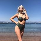 Ashley James flaunts her sensational hourglass curves in series of sizzling bikini stills.