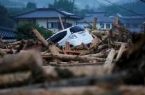 A damaged car is seen at an area hit by heavy rain in Asakura, Fukuoka Prefecture, Japan.