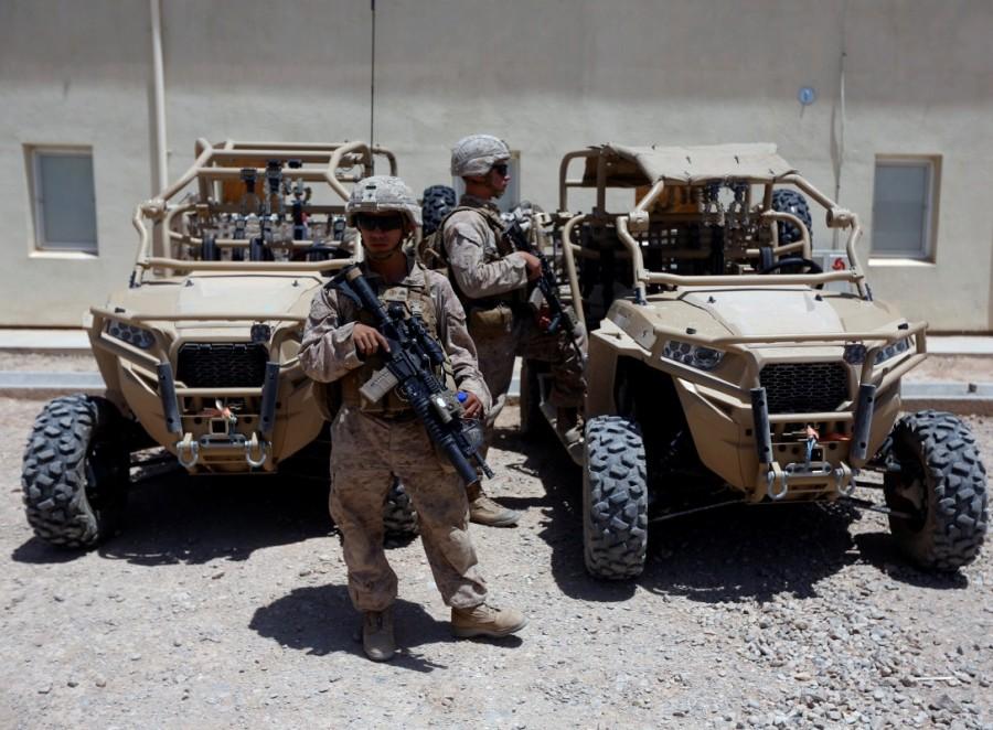 U.S. Marines keep watch while others attend training with Afghan National Army (ANA) soldiers. Afghan National Army,Afghan National,National Army,U.S. Marines,U.S. Marines train,Taliban insurgency