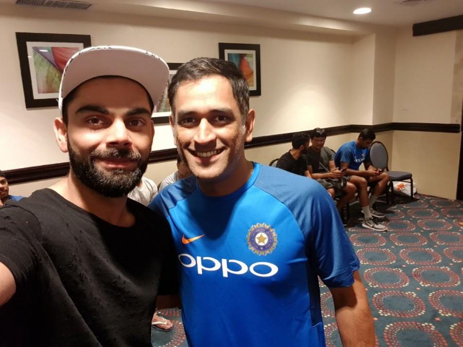 Former India captain Mahendra Singh Dhoni with Virat Kohli. Virat Kohli,MS Dhoni's 35th Birthday,Dhoni's 35th Birthday,Dhoni 35th Birthday,Dhoni Birthday,Dhoni Birthday celebrations,Dhoni Birthday celebration,Dhoni Birthday celebration pics,Dhoni Birthday celebration images,Dhoni Birthday celebration sti