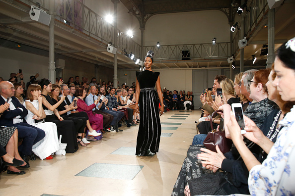 Director of 'Musee d'Art Moderne de la Ville de Paris', Fabrice Hergott, Isabelle Huppert, Zuo An Xiao and Jean-Paul Goude attend as Naomi Campbell walks in the Azzedine Alaia Fashion Show as part of Haute Couture Paris Fashion Week. Held at Azzedine Alaia Gallery on July 5, 2017 in Paris, France. Naomi Campbell,Naomi Campbell catwalk,Naomi Campbell's surprise catwalk,Naomi Campbell at Paris Haute Couture Fashion Week,Paris Haute Couture Fashion Week,Naomi Campbell new pics,Naomi Campbell new images,Naomi Campbell new stills,Naomi Campbell new
