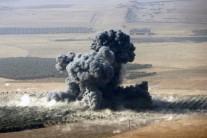 Smoke rises at Islamic State militants' positions in the town of Naweran, near Mosul.