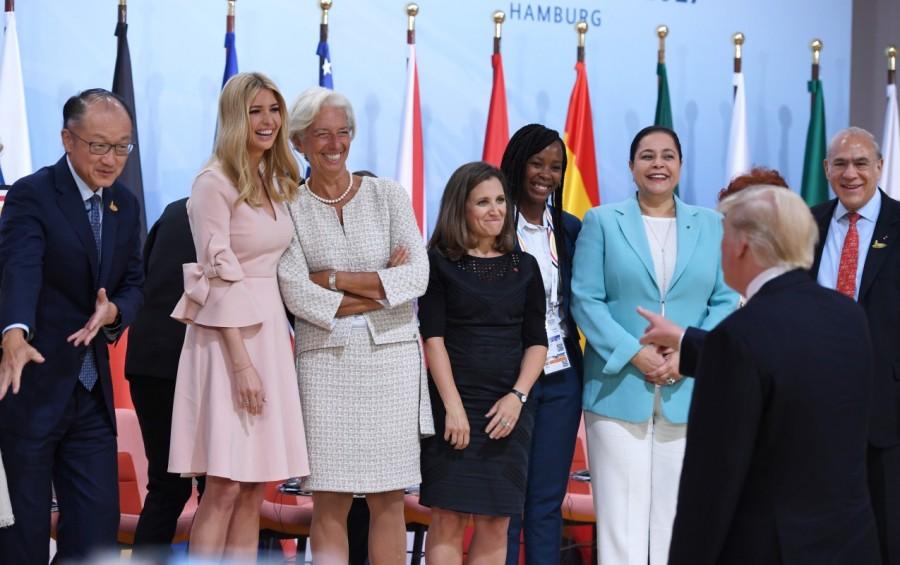 President Trump jokes as his daughter Ivanka Trumpposes with participants of the panel discussion Launch Event Women's Entrepreneur Finance Initiative. G20 Summit,G20 summit 2017,G20 Summit pics,G20 Summit images,G20 Summit stills,G20 Summit pictures,Argentinia's President Juliana Awada,Argentinia's President Mauricio Macri,French President's wife Brigitte Macron,French President Emmanuel