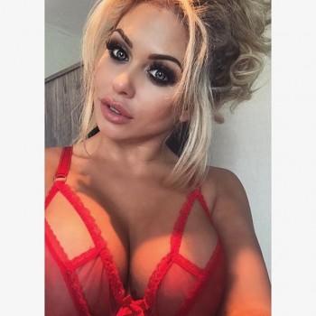 Busty Bianca Gascoigne shows her cleavage.