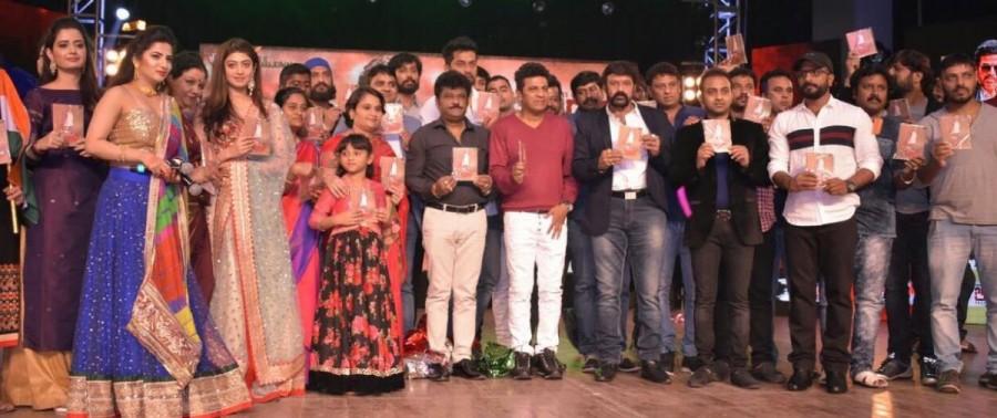 Kannada movie Mass Leader audio launch function held in Bangalore on 10th July 2017. Celebs like Nandamuri Balakrishna, Jaggesh, Shiva Rajkumar, Puneeth Rajkumar, Rragini Dwivedi, Pranitha Subhash, Loose Mada Yogesh and others graced the event. Rragini Dwivedi,Nandamuri Balakrishna,Pranitha Subhash,Jaggesh,Shiva Rajkumar,Puneeth Rajkumar,Loose Mada Yogesh,Mass Leader,Mass Leader audio launch,Mass Leader audio launch pics,Mass Leader audio launch images,Mass Leader audio launch stills,Mass Leader