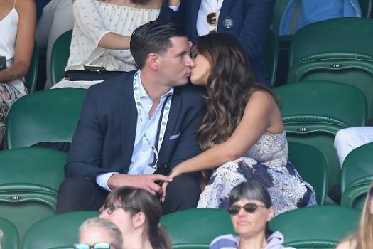 Vicky Pattison passionately smooches beau John Noble at Wimbledon.