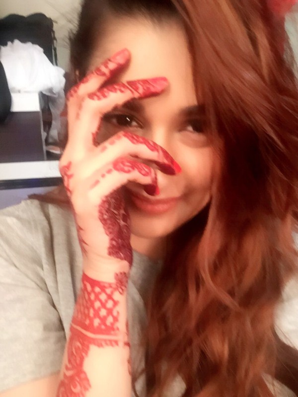 "Mehendi is one of the most fun filled functions in Indian wedding but it’s not only limited to weddings, throughout the year when we girls get chance we adorn our hand and feet by mehendi. And recently I had it. In working schedule its really difficult to get time for Mehendi. But luckily I made my way to put real one for scenes of my shoots." Yuvika said in her statement. Yuvika who will be soon seen in a bollywood movie yet to be announced opposite Jimmy Shergill finds herself crazy for Mehendi since childhood. Yuvika Chaudhary,Yuvika Chaudhary Mehendi ceremony,Biggboss 9,Biggboss 9 content Yuvika Chaudhary