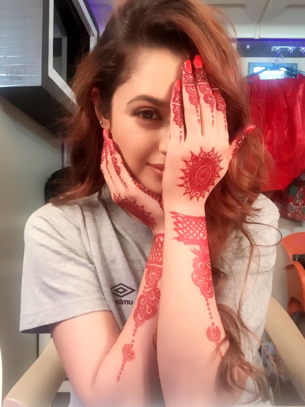 She shares, "I have been always been intrigued by mehendi from childhood when I use to see my classmates putting it getting back home, I use to ask my mom to put me Mehendi. I totally loved the look and didn’t leave any occasion to get mehendi done on my hands. As years went by I am more into western wear and hectic life doesn’t give me opportunity to get mehendi done as much as I love to. But looking my hands now I am going crazy and excited and clicking myself from different angles and style." Yuvika Chaudhary,Yuvika Chaudhary Mehendi ceremony,Biggboss 9,Biggboss 9 content Yuvika Chaudhary