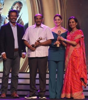 Baahubali Actress Tamannaah Bhatia & Writer Vijayendra Prasad won the Global Indian Impact Icon Award at NRI Awards 2017. The Award was present by MK Anand - MD & CEO of TIMES Network & Chanda Kochhar - MD & CEO of IC.