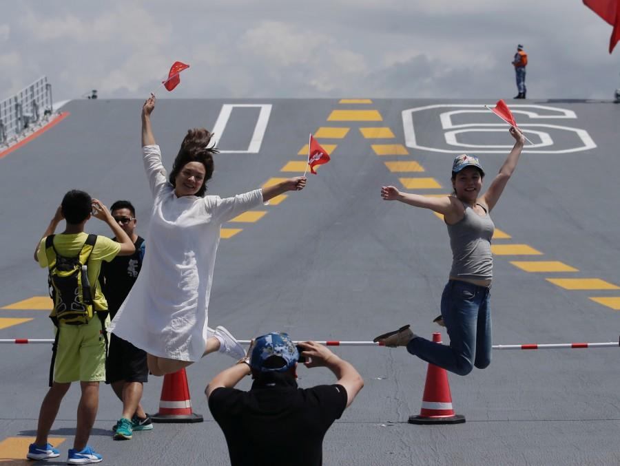 Thousands of Hong Kong residents queued for hours on Monday for just 2,000 tickets for access to the vessel this weekend. Many left empty handed. China's first aircraft,Liaoning China's first aircraft carrier,China first aircraft carrier,China aircraft carrier,China military
