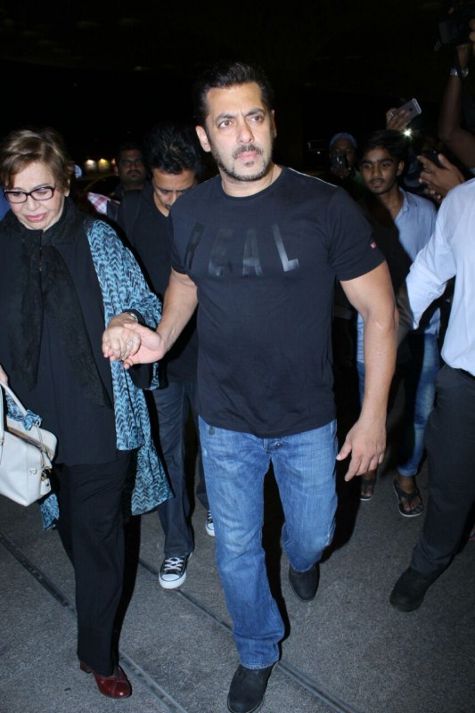 Bollywood film actor Salman Khan & his mother Helen spotted at International airport for IIFA Awards. Salman Khan with Mom Helen,Salman Khan,actor Salman Khan,IIFA 2017,Salman Khan at IIFA 2017,Salman Khan at IIFA,Helen,Salman mother Helen