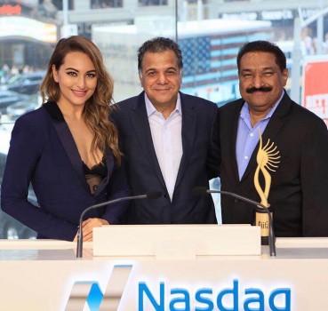 Actress Sonakshi Sinha, Raj Nayak and Sabbas Joseph at The Nasdaq Stock Exchange Bell.