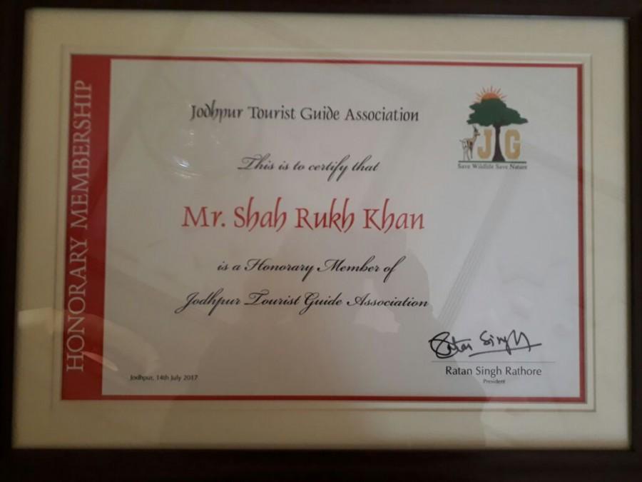 The association marks to be a gesture of awe by the Guides to Shah Rukh Khan who will be seen playing the role of a Tourist Guide in his upcoming film 'Jab Harry met Sejal'. Ratan Singh Rathore had earlier said while expressing his desire to felicitate him, "We are very excited to bestow Shah Rukh Khan with an Honorary Membership at our Jodhpur Tourist Guide Association. It would be an honour to host him. It is a matter of pride that he would represent our profession in Jab Harry met Sejal. We are happy as he will bring recognition to the job of a Tourist Guide." Shah Rukh Khan,SRK,Jab Harry met Sejal,Shah Rukh Khan accepts Honorary Membership,Jodhpur Tourist Guide Association