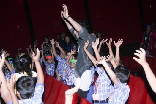 Bollywood actor Ranbir Kapoor interacts with kids at a special screening of Jagga Jasoos.