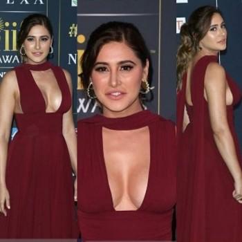 Bollywood actress Nargis Fakhri flaunts her curves at IIFA Awards 2017.