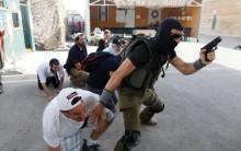 A group of tourists take part in a two hour "boot camp" experience, at "Caliber 3 Israeli Counter Terror and Security Academy " in the Gush Etzion settlement bloc south of Jerusalem in the occupied West Bank. It is part of a counter-terrorism "boot camp" organised by Caliber 3, a company set up by a colonel in the Israeli army reserves.