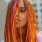 Since her breakout in 2001 with her album "Songs in A Minor", Keys' most recognizable hairstyle has been braids.