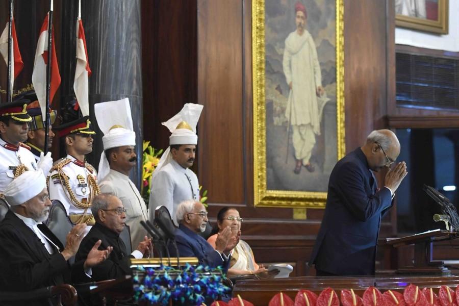 Immediately after the oath taking ceremony, Kovind, 71, exchanged the chair with Mukherjee to take over the top constitutional post of India - as the head of the state and supreme commander of the Indian Armed forces. Ram Nath Kovind,NDA Ram Nath Kovind presidential candidate,Ram Nath Kovind takes oath,14th President of India,Ram Nath Kovind as 14th President of India