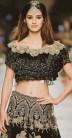 Young and vivacious Disha Patani added glamour to the Manav Gangwani's show at the India Couture Week (ICW) 2017 when she walked for the designer as a showstopper in black trousseau with 'maang tikka' adding drama to her looks. "I think 'Maang tikka' gave a different look to my personality and it also broke the monotony. I love 'maang tikkas', it just adds so much to your face," Patani told reporters post her confident ramp walk on day two of the ongoing fashion week, here.