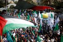 Palestinians take part in a protest against Israel's new security measures at the entrance to the al-Aqsa mosque compound, in Gaza City.