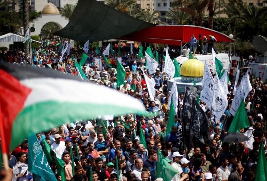 Palestinians take part in a protest against Israel's new security measures at the entrance to the al-Aqsa mosque compound, in Gaza City. Jerusalem metal detectors,Jerusalem,Jerusalem detectors,Aqsa mosque,Jerusalem Old City,Israel removes Jerusalem metal detectors,Israel