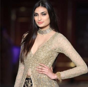 Bollywood actress Athiya Shetty dressed up in a glittery outfit looked no less than a princess for designer-duo Shyamal and Bhumika's maiden show at India Couture Week (ICW) 2017, here on Wednesday. The designer duo showcased their new couture collection titled 