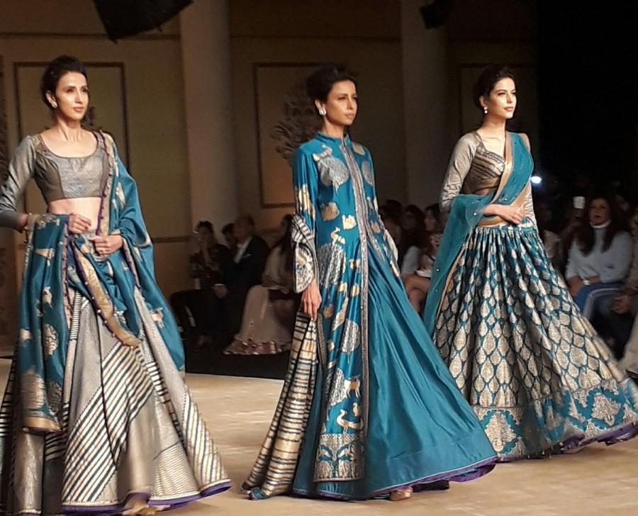 It was not just the showstopper Bhumi Pednekar who added glamour to her show at the India Couture Week (ICW) 2017, but the finest selection of colours also made designer Reynu Taandon's collection a little more chic, classy and elegant. Remaining true to her roots, Taandon in association with Rajnigandha presented collection titled "CYAN" awhich was inspired from the mysticism of peacock blue hues. Reynu Taandon,Bhumi Pednekar,India Couture Week,India Couture Week 2017,designer Reynu Taandon,Reynu Taandon collection