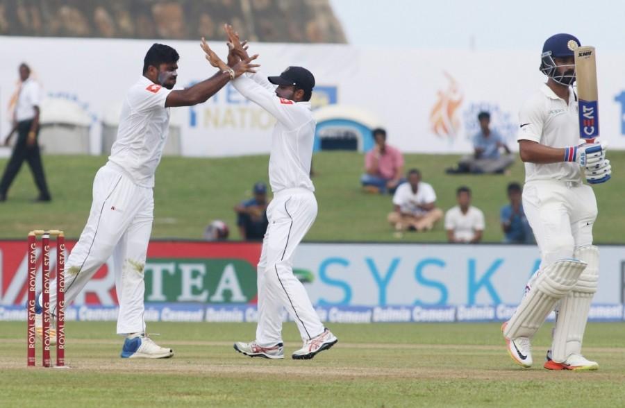 Brief scores: India (first innings): 600/10 (Shikhar Dhawan 190, Cheteshwar Pujara 153; Nuwan Pradeep 6/132) against Sri Lanka. Hardik Pandya,Mohammad Shami,India vs Sri Lanka 1st Test,India vs Sri Lanka,India vs Sri Lanka 2017