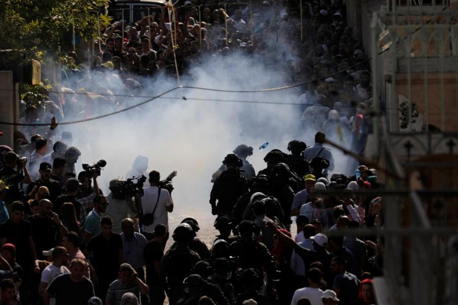 Stun grenades explode at the entrance to the compound known to Muslims as Noble Sanctuary and to Jews as Temple Mount. Jerusalem holy site,Jerusalem holy,Muslim worshippers,Jerusalem's Al-Aqsa Mosque,Israel