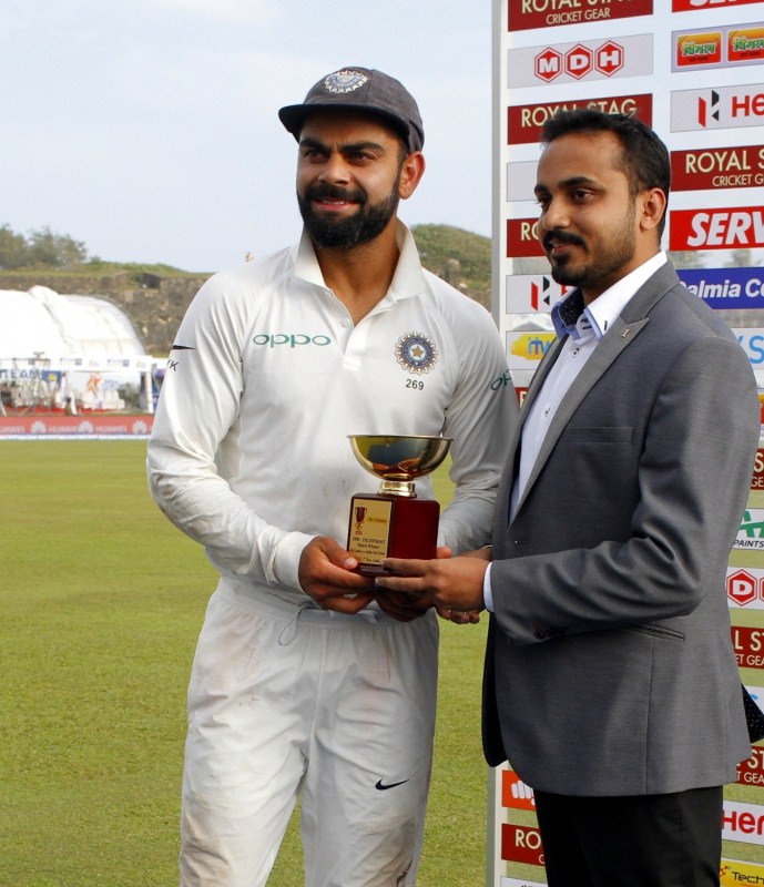 Brief Scores: India 600, 240/3 (Virat Kohli 103 not out, Abhinav Mukund 81) beat Sri Lanka 291, 245 (Dimuth Karunaratne 97, Niroshan Dickwella 67, Ravichandran Ashwin 3/65, Ravindra Jadeja 3/71) by 304 runs. India thrash Sri Lanka,India thrash Sri Lanka by 304 runs,Ravichandran Ashwin,Ravindra Jadeja