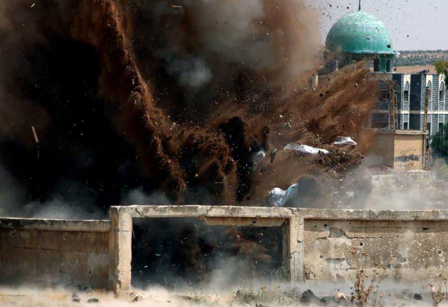 Civil defense members safely detonate cluster bombs in the rebel-held area in Deraa, Syria. Syria,southwest Syria,cluster bombs,Syria cluster bombs